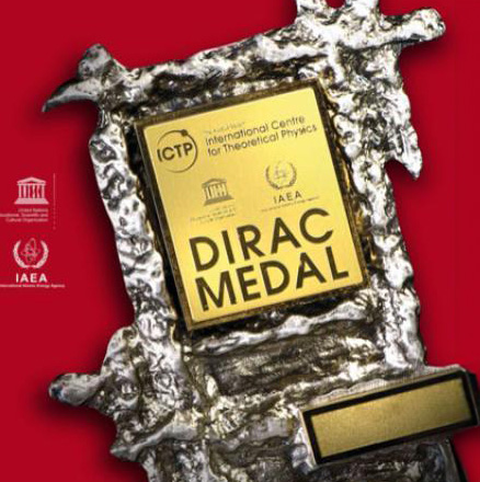 The image displays the Dirac Medal, a prestigious award for theoretical physics